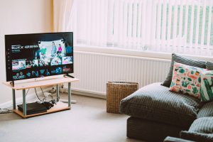 One way to reduce screen time, and get better sleep is to move the TV out of your bedroom.