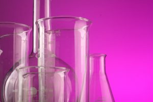 Test tubes of all different sizes lined up next to each other.