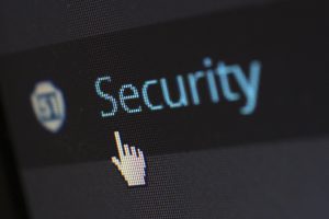 cyber security pixelized on a screen with cursor