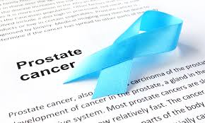 blue ribbon with the words "prostate cancer" next to it.