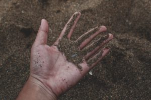 hand holding composted soil