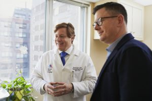 business owner talking to a doctor about an HRA