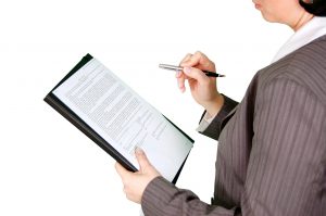 senator looking at senate bill 86 on a clipboard