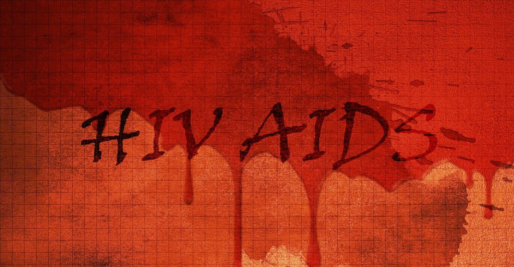 HIV AIDS written in black surrounded by red dripping colors as a wallpaper.