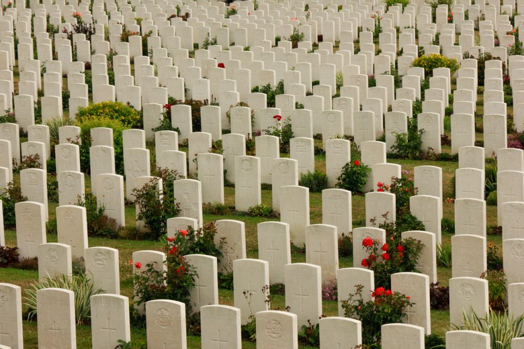 Cemetery with white tombstones