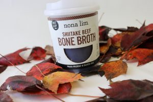 nona lim broth cup with leaves in the background