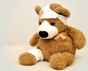 sick teddy bear with best health insurance plan