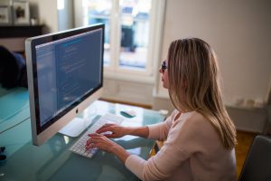 employee using a computer to engage the market