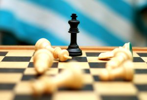 chess pieces to teach business owners risk management