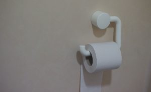 toilet paper roll mounted on wall