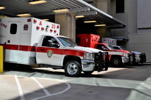 different emergency vehicles parked next to each other.
