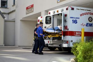 Person being taken out on ambulance