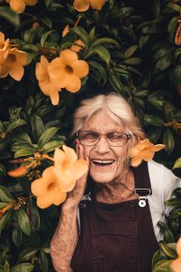 woman happy with both Medicare and Medicaid