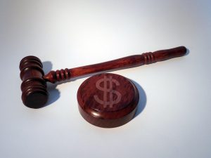gavel with money sign on the wood
