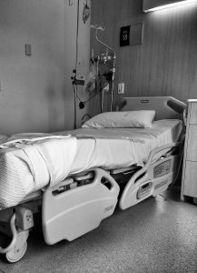 black and white picture of a hospital bed