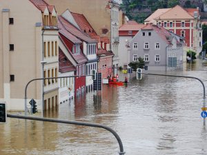 buildings with high water flooding the area.