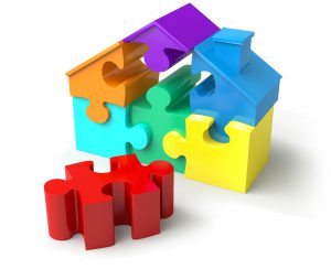 house made of different colored puzzle pieces.