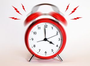 red clockset on 4 o clock with red lightning bolts around it.