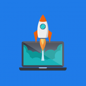 cartoon rocket ship that is red and white going up in front of a laptop.