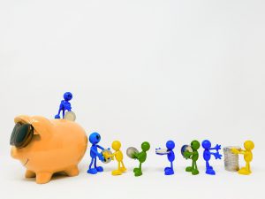 piggy bank with little characters carrying money and handing it off to the next until it reaches the piggy bank.