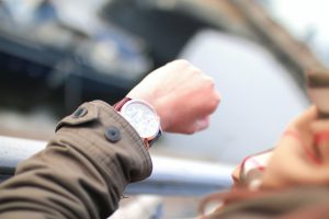 persons hand with the watch being shown