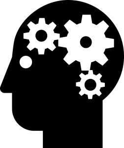 silhouette of person's head with white gears in it.