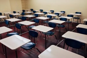 empty classroom with chairs and desks