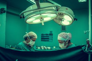 two doctors in surgery room 