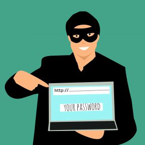 burglar in a black mask holding a laptop with your password on the screen