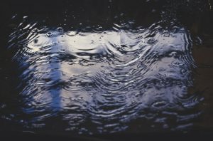 a puddle of water on the ground