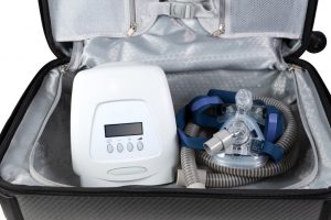 CPAP machine in a bag with the tubes