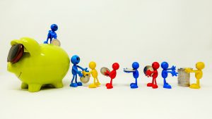 different people ficures carrying a coin to a piggy bank with someone standing on top grabbing the coin