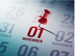 november 1st on a calendar in red with a red thumbtack on it