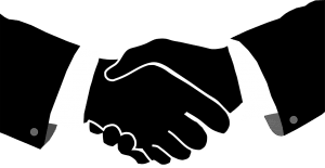 illustration of black hands shaking with a black and white suit on the arms