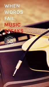 when words fail, music speaks written in front of a guitar piece