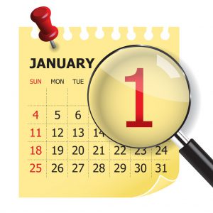 january calendar with a magnifying glass over the one 
