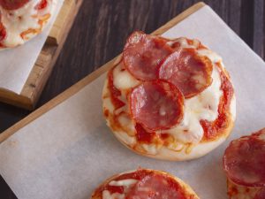 mini pepperoni pizzas on a plate