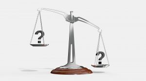 metal scale with a question mark on each side