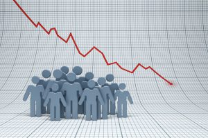 cartoon people standing under a red arrow spiraling downwards on a graph