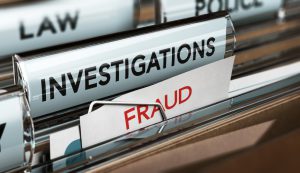 files with one tag saying investigations and the one in front of it saying fraud in red.