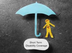 cutout of a person with a blue umbrella over them and short term disability coverage underneath them