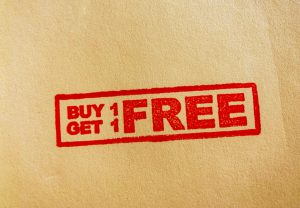 buy one get one free stamped on tan paper.