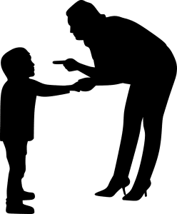 silhouette of a parent holding a kids hand while bent down and pointing their finger at the kid.