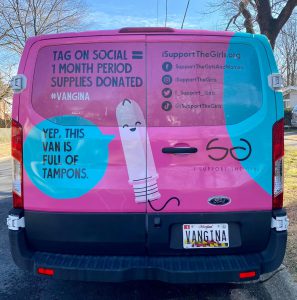a pink and blue van with information of I support the girls organization