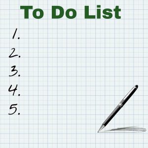 to do list numbered 1 to 5 with a pen on the bottom