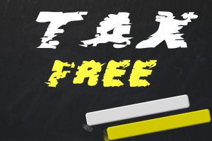 tax free written on a blackboard in white and yellow