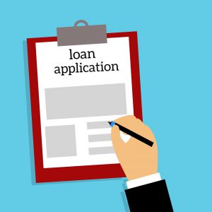 illustration of a hand filling out a loan application sheet of paper