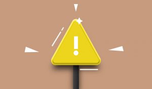 exclamation point in a yellow triangle.