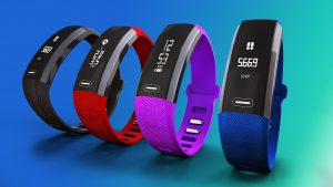5 fitness trackers in different colors