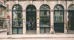 old looking building with tall glass windows in Montreal
